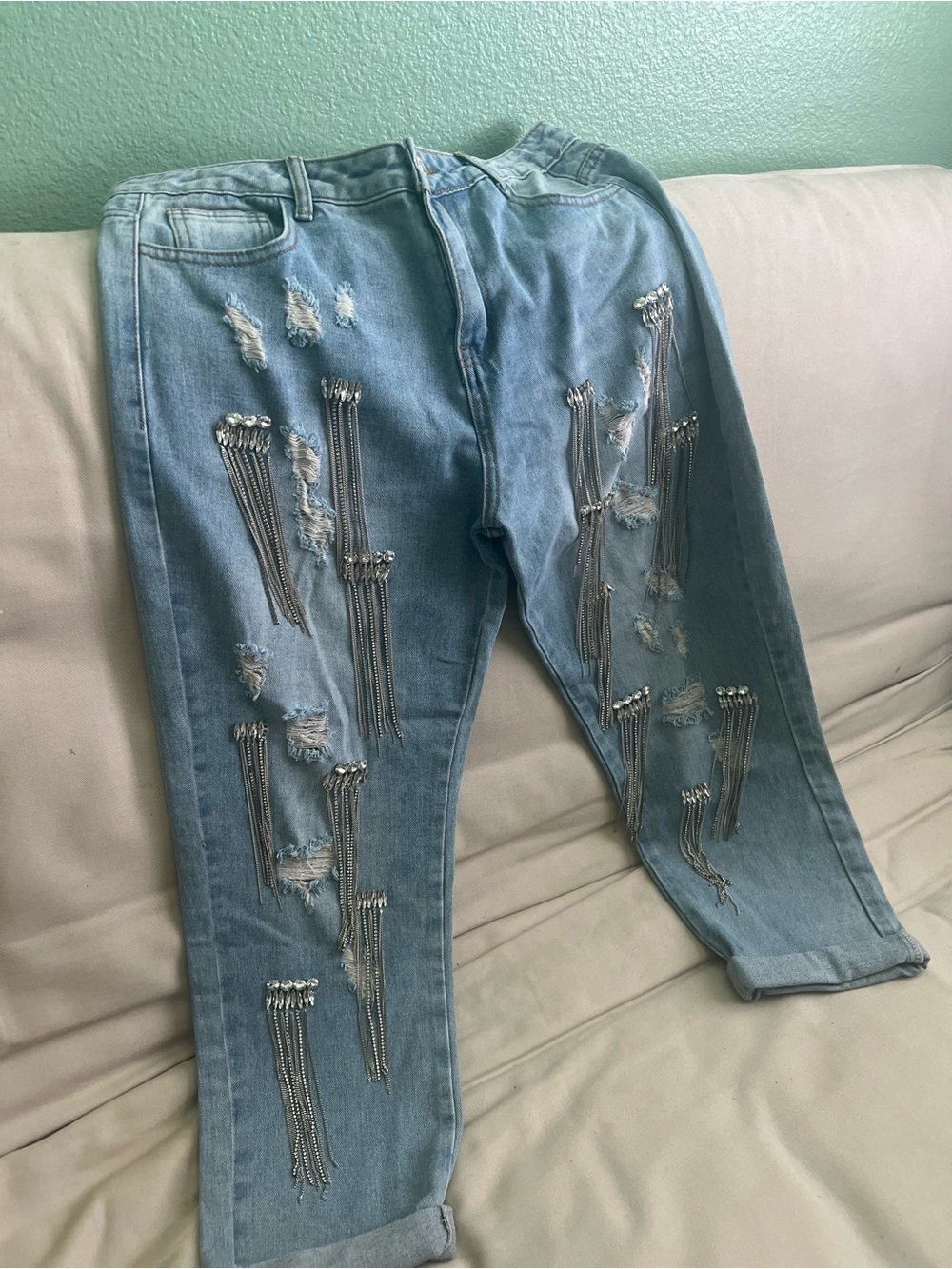 Light Blue Distressed Women's Jeans with Chain Embellishments